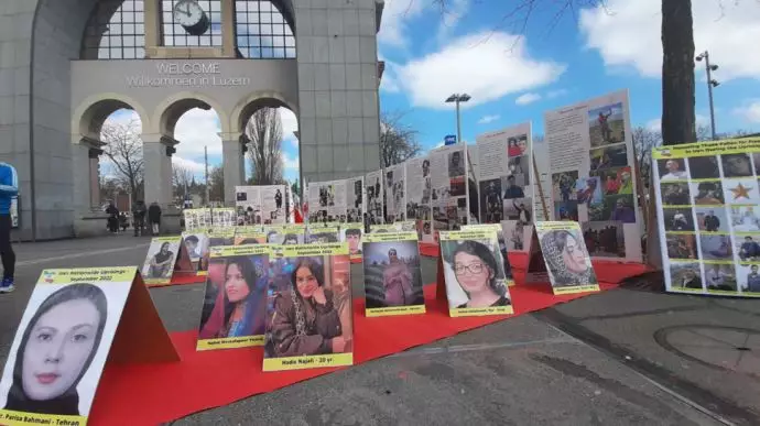 لوزيرن، سويسرا - مظاهرة من قبل أنصار منظمة مجاهدي خلق الإيرانية لدعم الانتفاضة الوطنية والتضامن معها