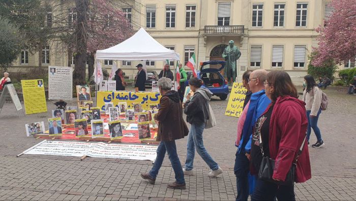 تقرير مصور – هایدلبرغ – طاولة كتب ومعرض لصور شهداء الانتفاضة الإيرانية