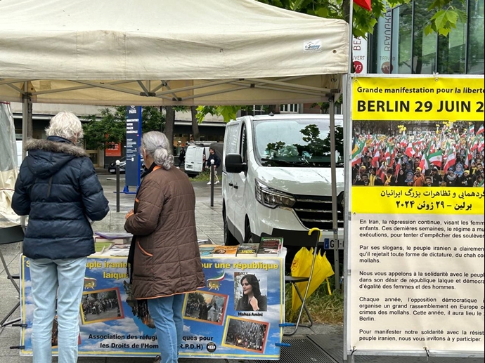 تقرير مصور - باريس - طاولة كتب ومعرض لصور شهداء الانتفاضة الإيرانية