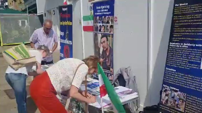 وينتشستر، إنجلترا - معرض للكتب وعرض لصور شهداء انتفاضة الشعب الإيراني