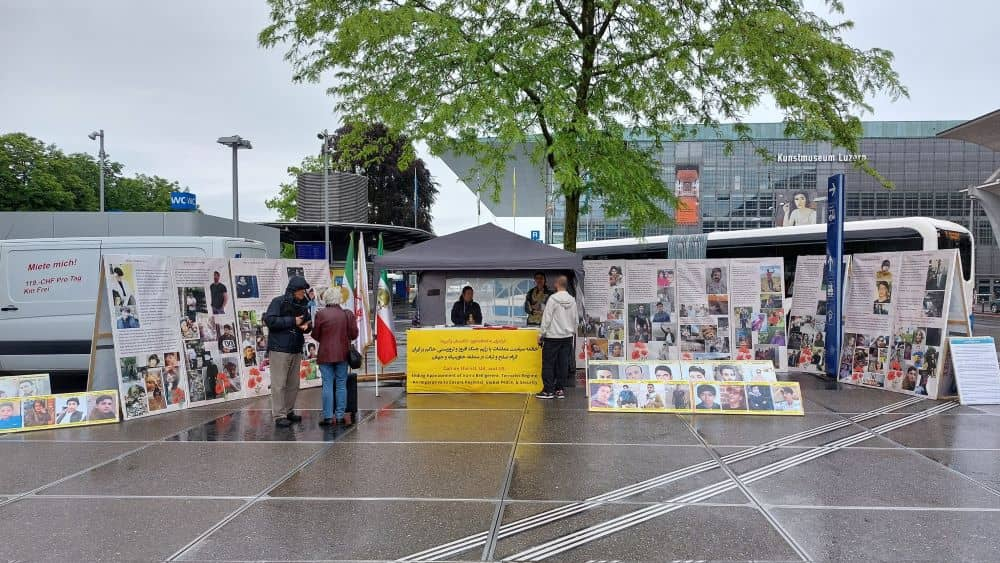 لوتزيرن سويسرا – طاولة كتب ومعرض لصور الشهداء تضامنا مع الانتفاضة الوطنية في إيران