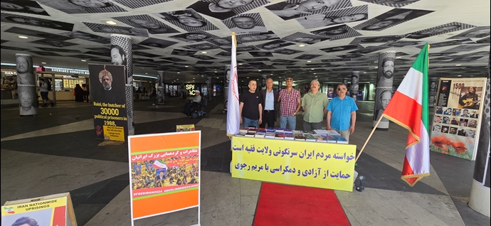 باريس وستوكهولم - طاولة كتاب ومعرض لصور شهداء الانتفاضة الإيرانية