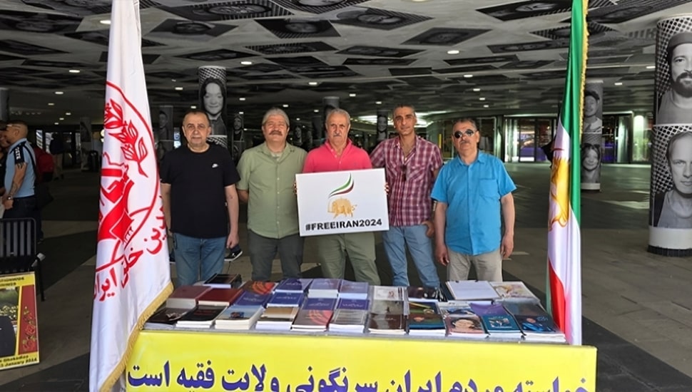 باريس وستوكهولم - طاولة كتاب ومعرض لصور شهداء الانتفاضة الإيرانية