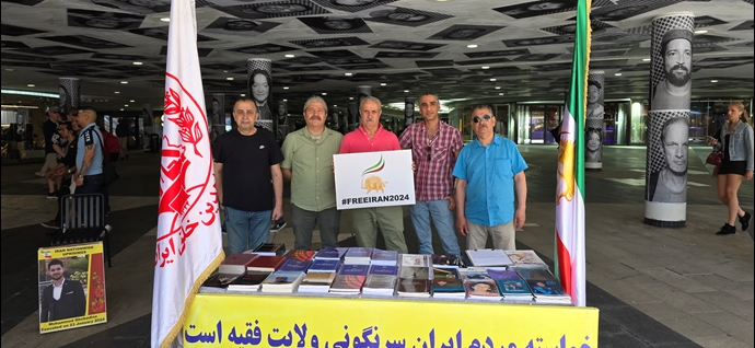 باريس وستوكهولم - طاولة كتاب ومعرض لصور شهداء الانتفاضة الإيرانية