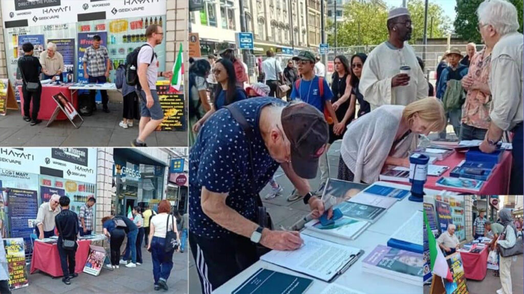 مانشستر، إنجلترا - طاولة كتب ومعرض لصور شهداء الانتفاضة الإيرانية