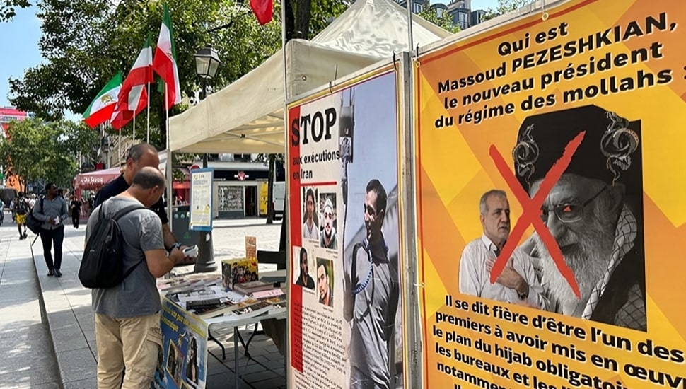 باريس - طاولة كتاب ومعرض لصور شهداء الانتفاضة الإيرانية