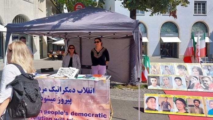 زيورخ، سويسرا – طاولة كتب ومعرض لصور الشهداء تضامنا مع الانتفاضة الوطنية في إيران 