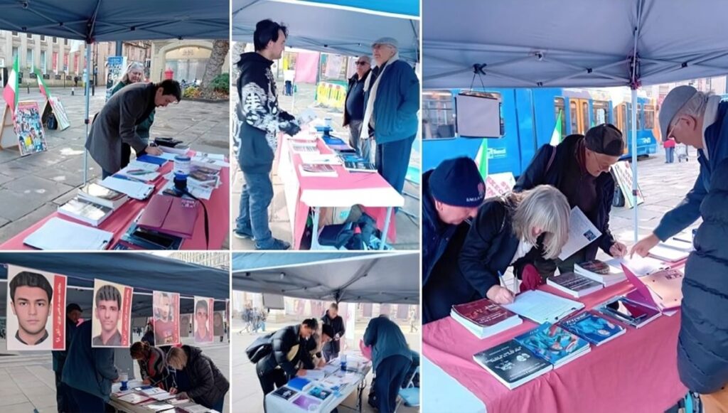 مانشستر، إنجلترا - طاولة كتاب ومعرض لصور شهداء الانتفاضة الإيرانية