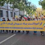 تظاهرة حاشدة للجالية الإيرانية في باريس بذكرى انتفاضة 2022