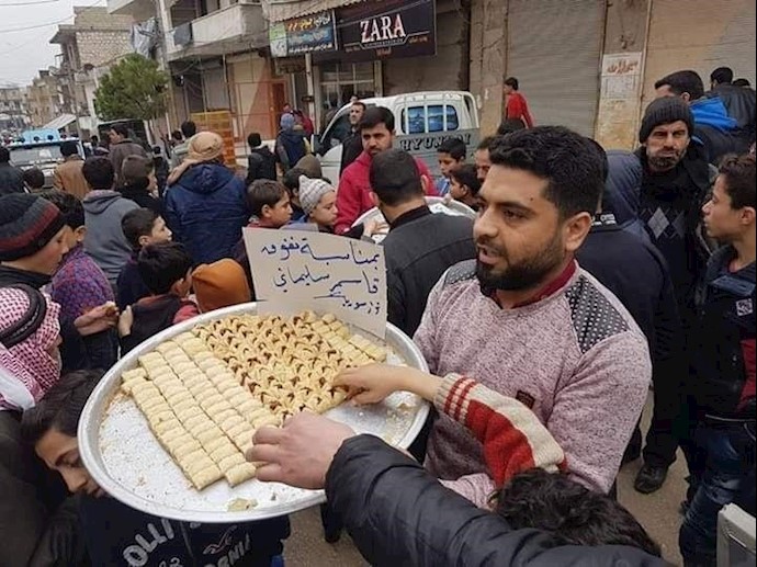 مظاهرات فرح في العراق وتوزيع حلوى في سوريا