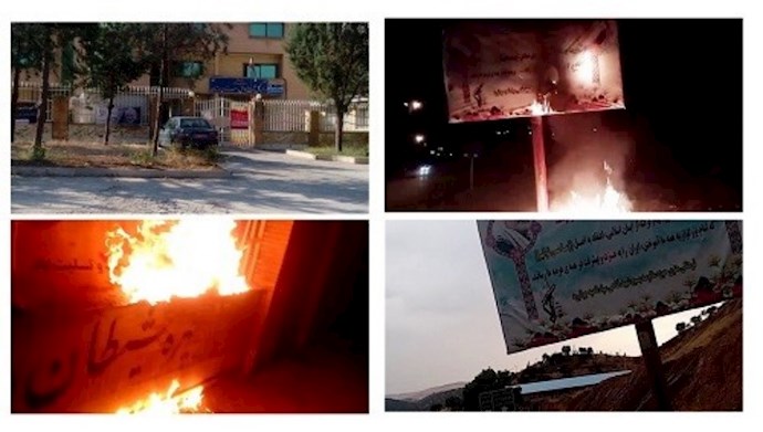 جوانرود و خرم آباد – إضرام النار في لافتة تحمل صورتين بغيضتين لخامنئي و قاسم سليماني – 30 يوليو 2020